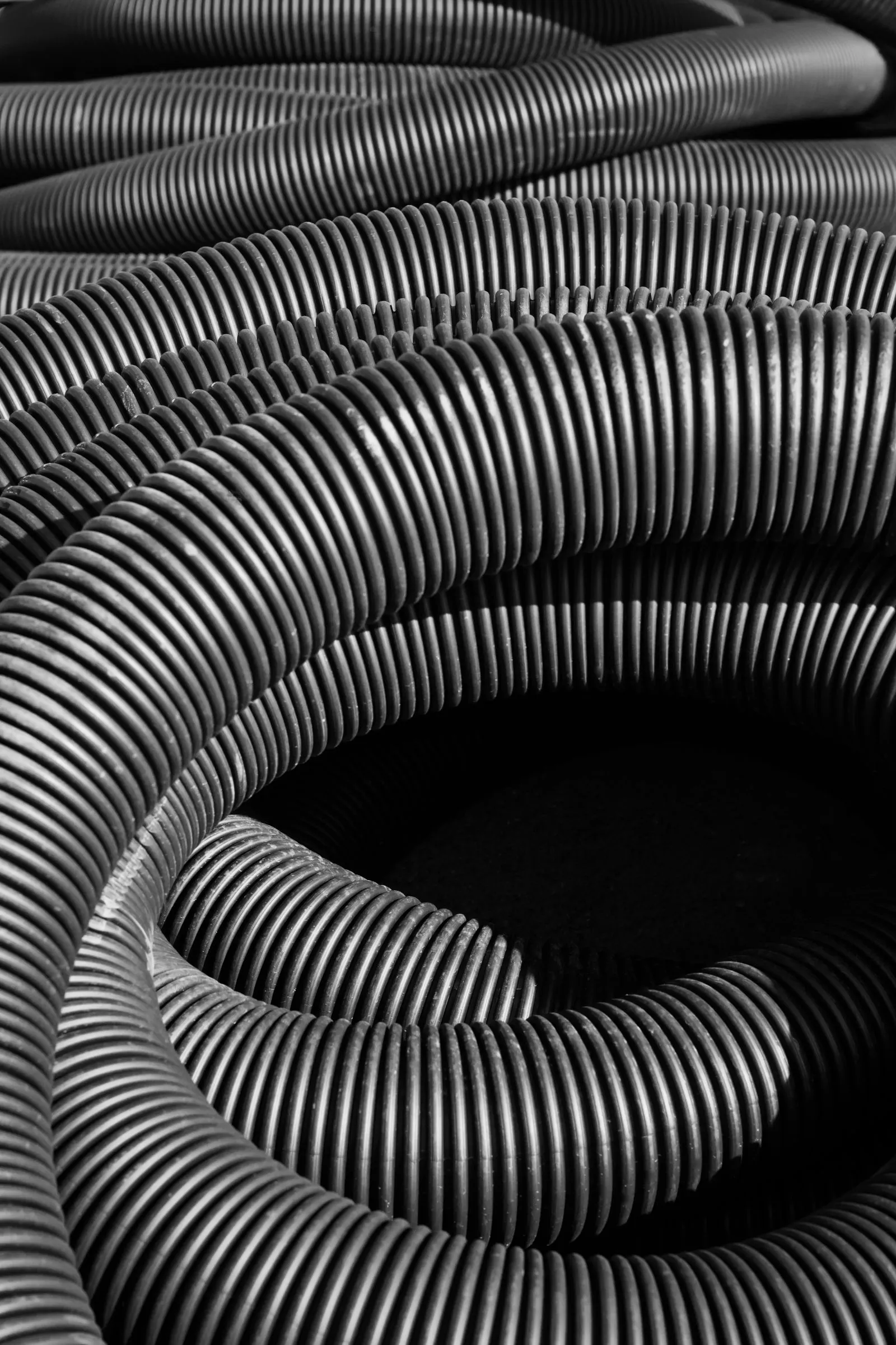 Corrugated flexible pipe coils
